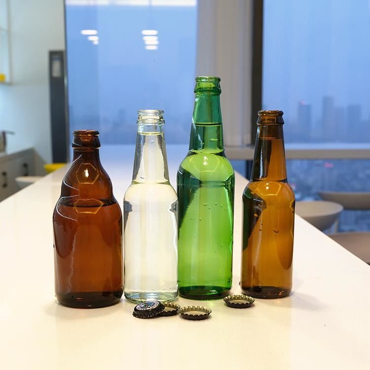 고품질의 녹색 앰버 맥주 유리 병 맑은 뜨거운 스탬핑 음료 맥주